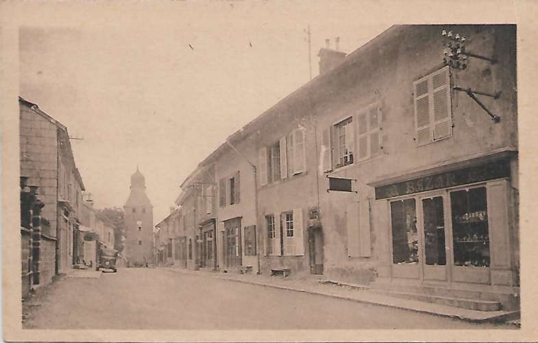 CPA - NOZEROY - Grande Rue et Tour de l'Horloge.