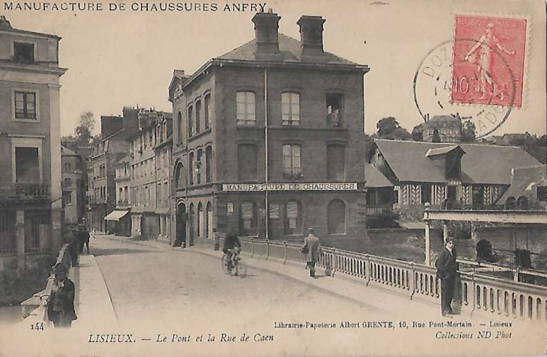 CPA - LISIEUX - Le Pont et la Rue de Caen.