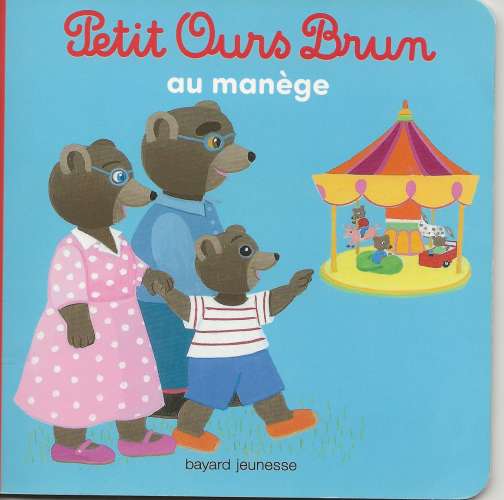 PETIT OURS BRUN AU MANEGE